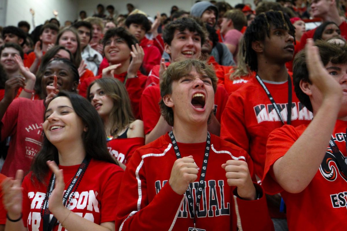 The junior class cheering during the pep rally. 