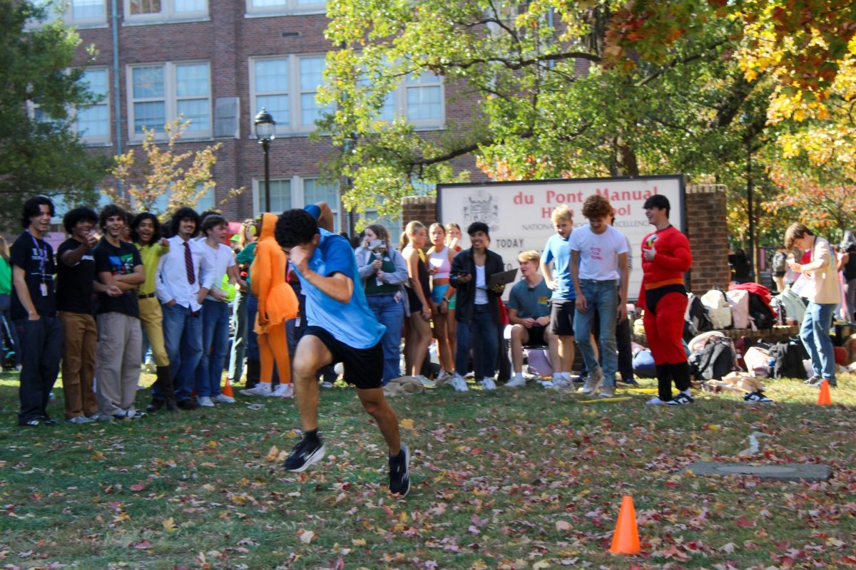 Manual students compete in the Carnival's relay races. 