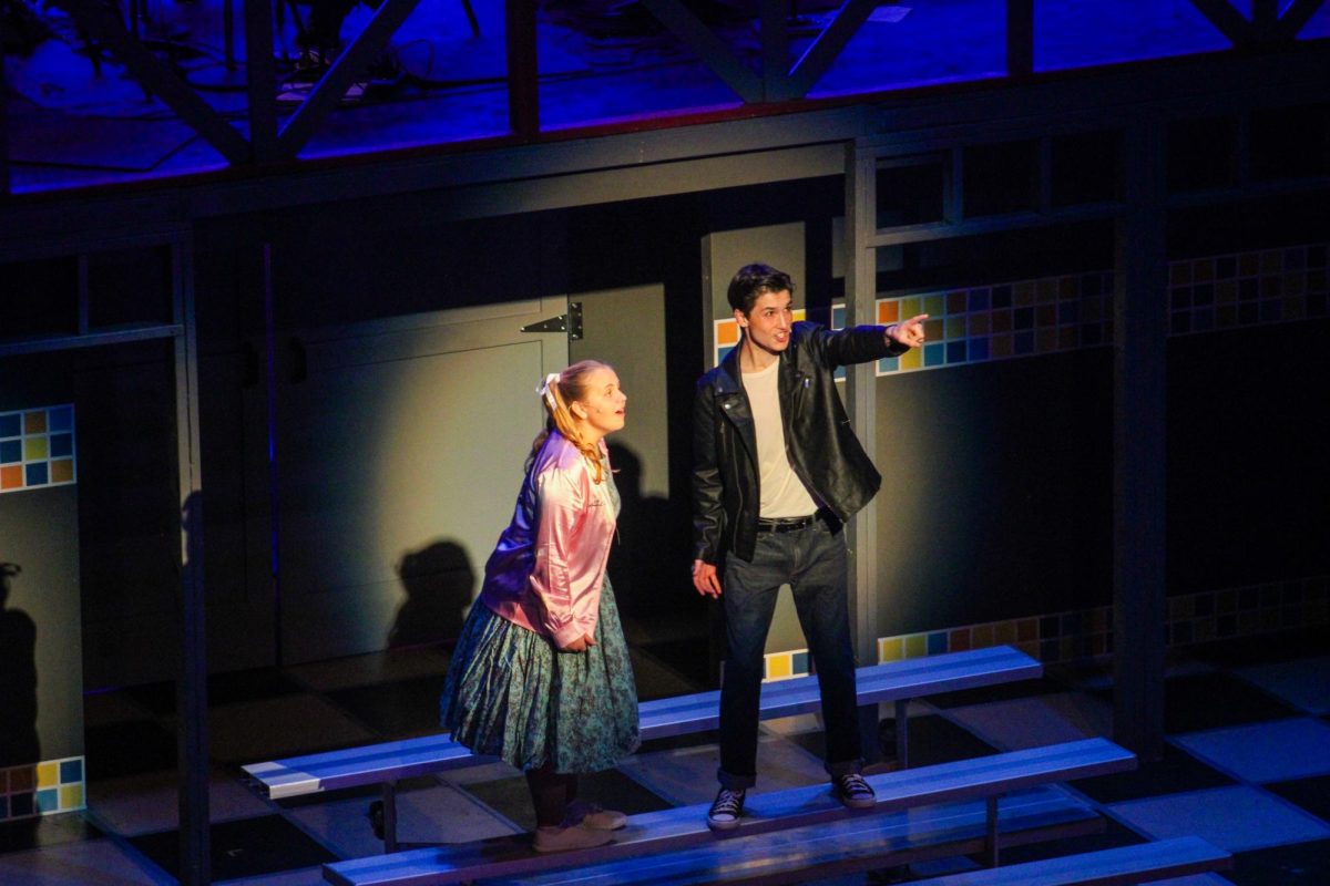 Liam Curry (11, YPAS) and Abigail Stansbury (11, YPAS) sing together in the musical.