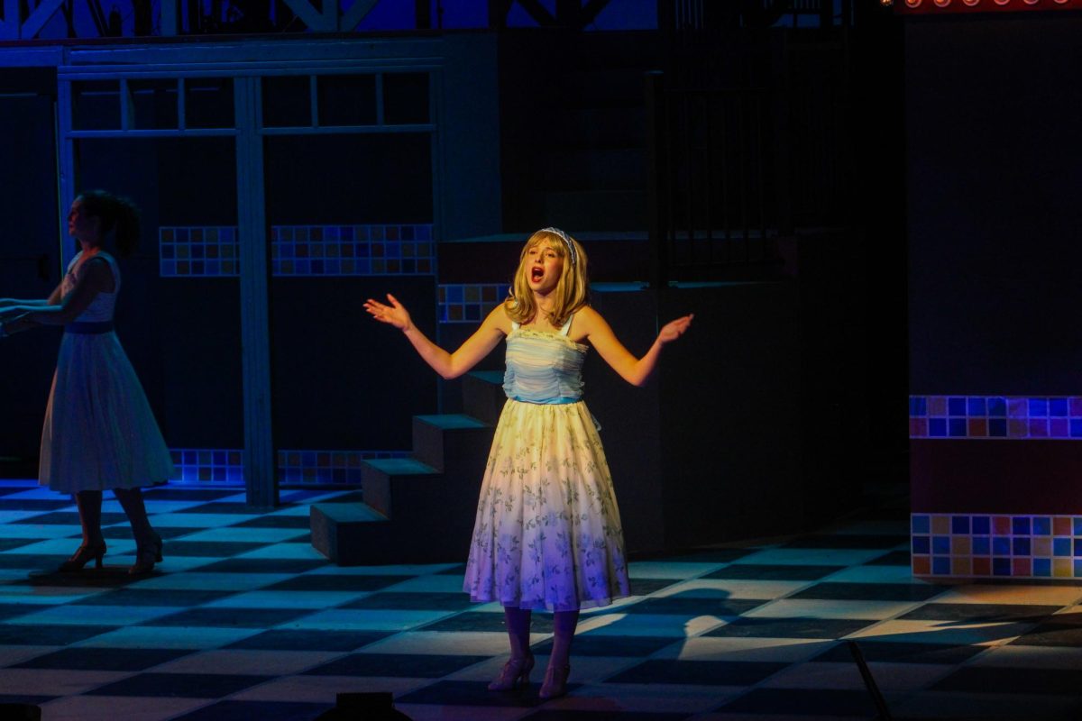 Bailey Evans (11, YPAS) singing passionately in the musical.