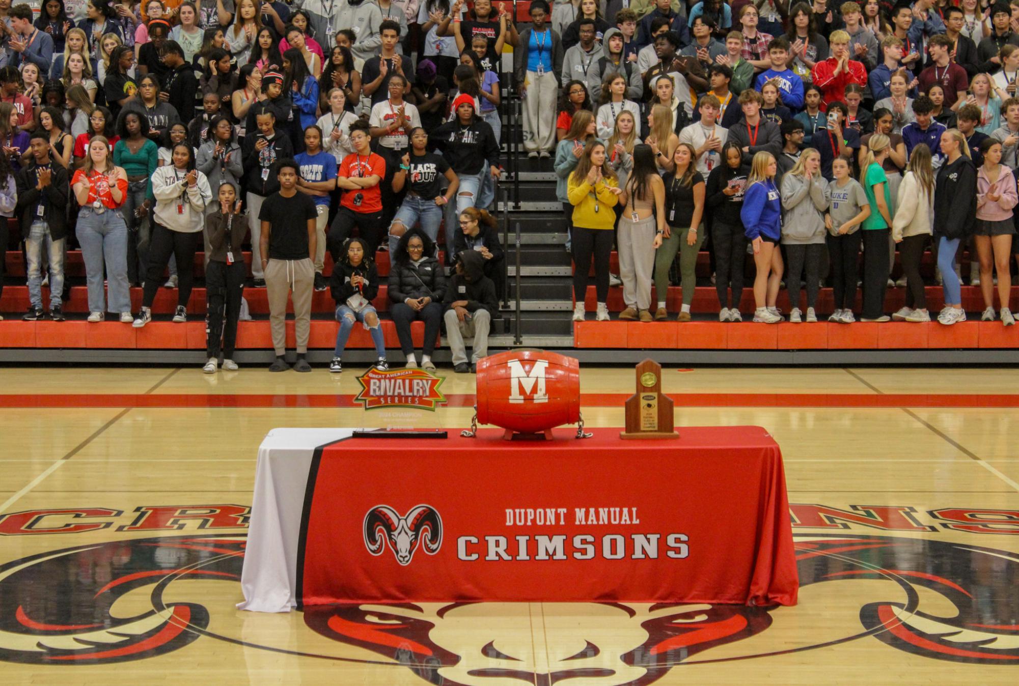 The barrel on display, along with other trophies for the students to see.