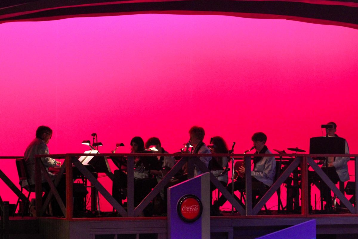 The live band playing as the sun rises in the musical.