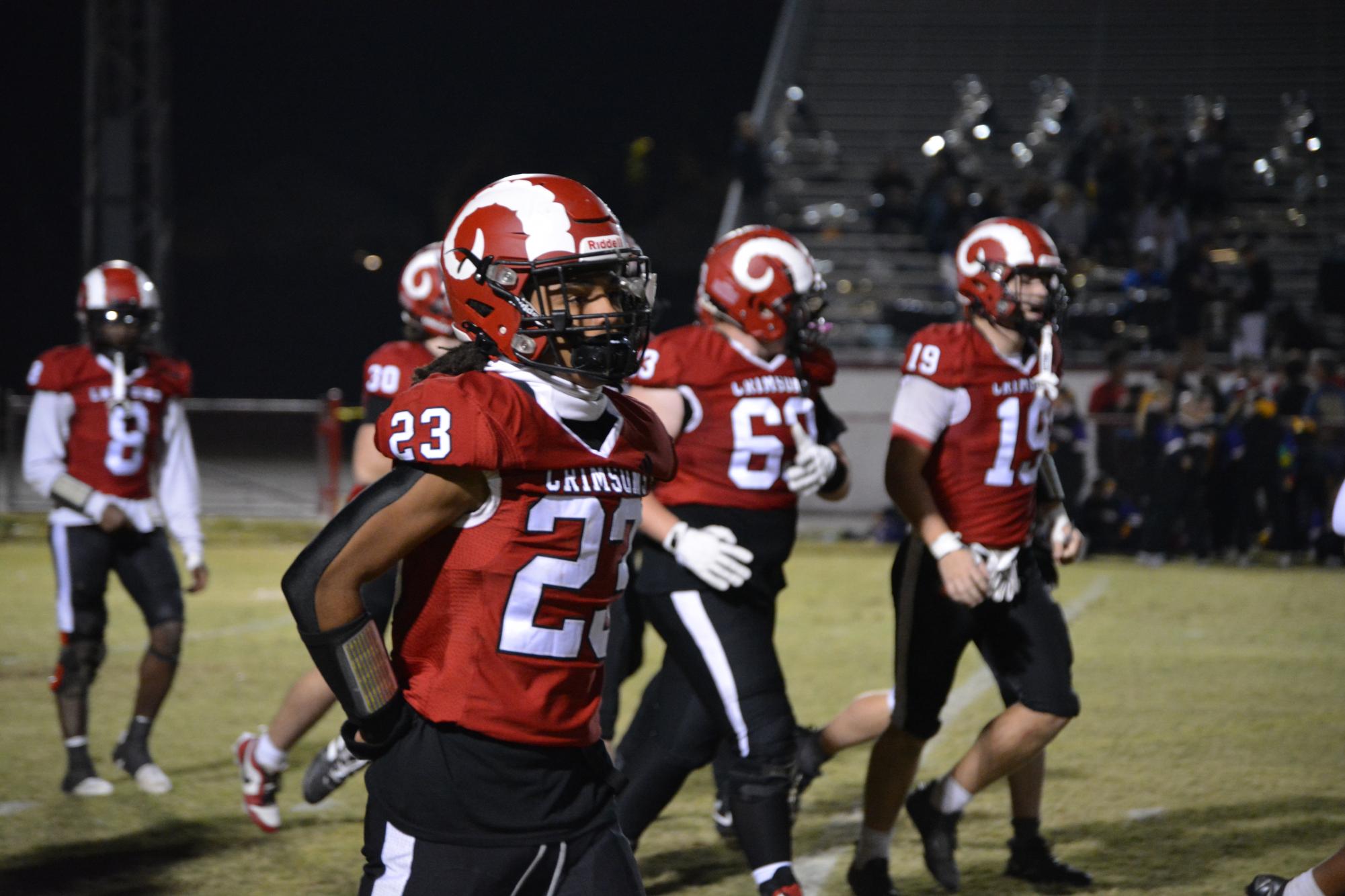 Some of Manual's players come onto the field. 