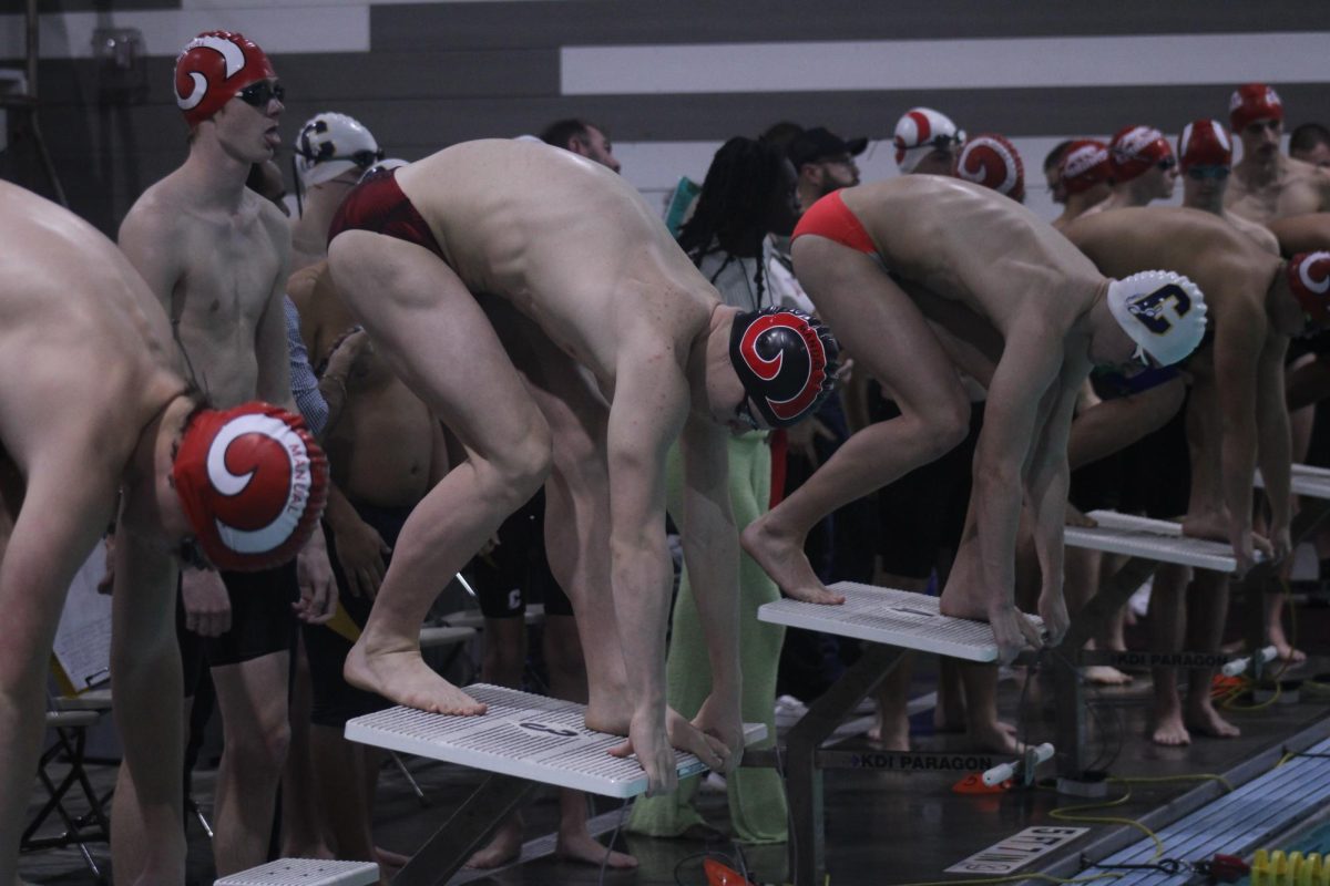 The Crimsons prepare to dive into the pool. 