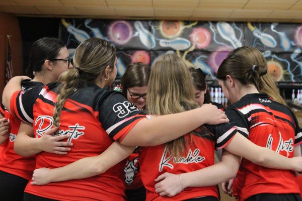 The team huddles together prior to the start of the match. 