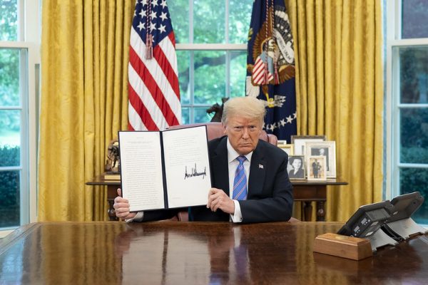 President Donald Trump has signed dozens of Executive orders in his first two weeks in office. Official White House photo by Tia Dufour. 