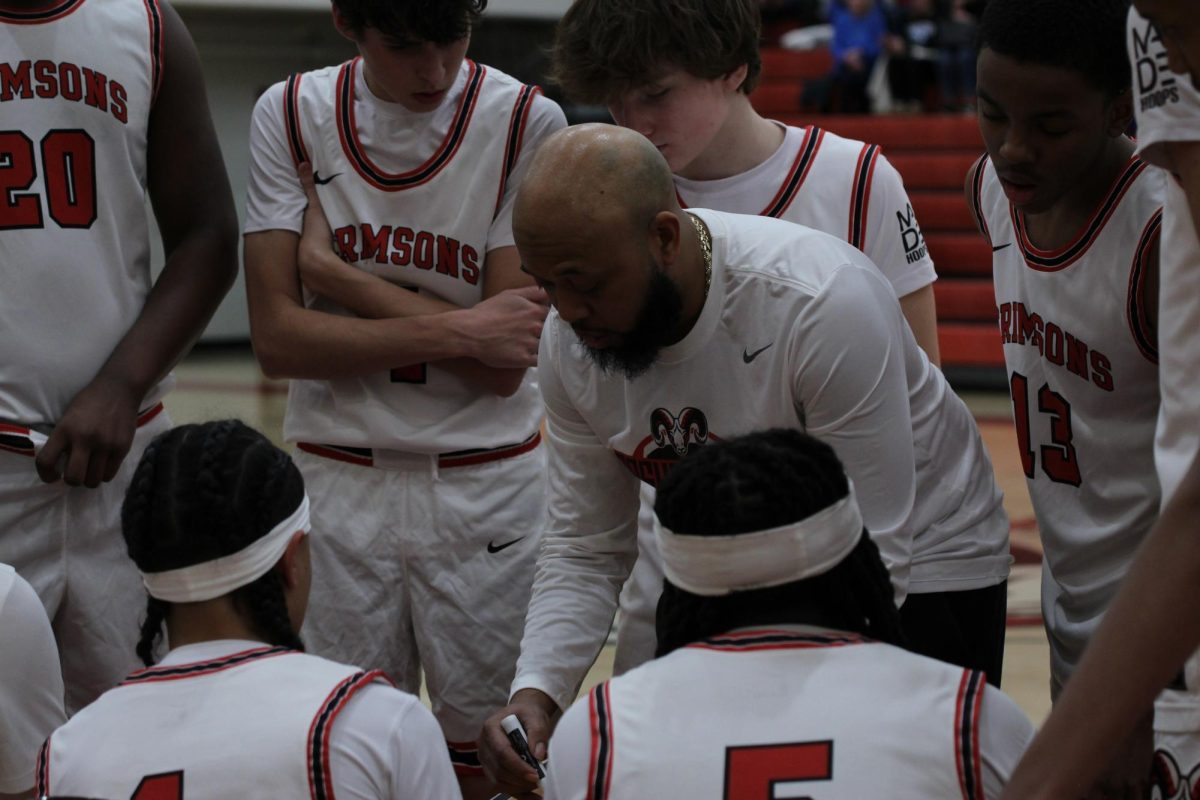 Coach Flippins instructing the team for a new play.