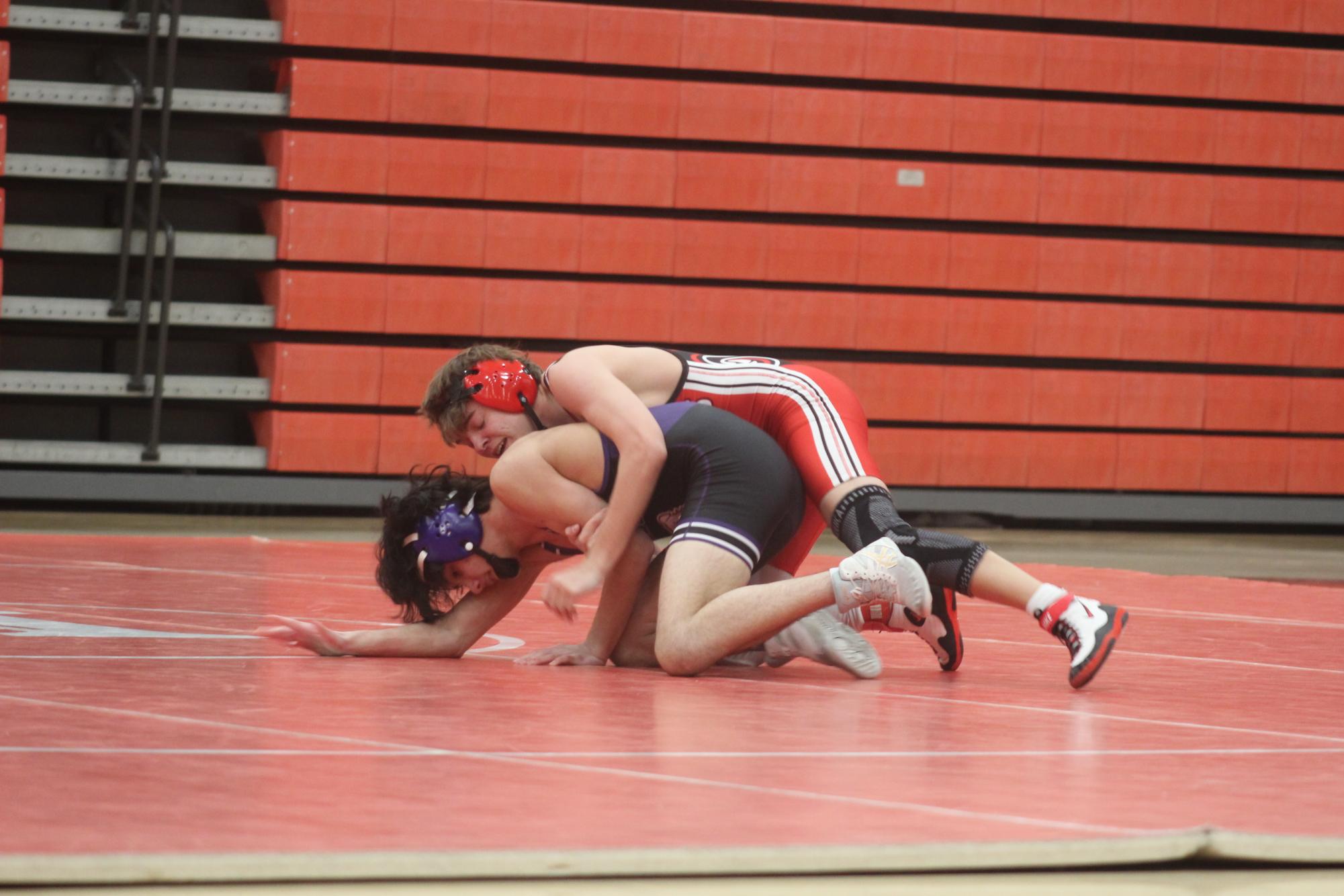 Max Fee (11, YPAS) wrestling an opponent.