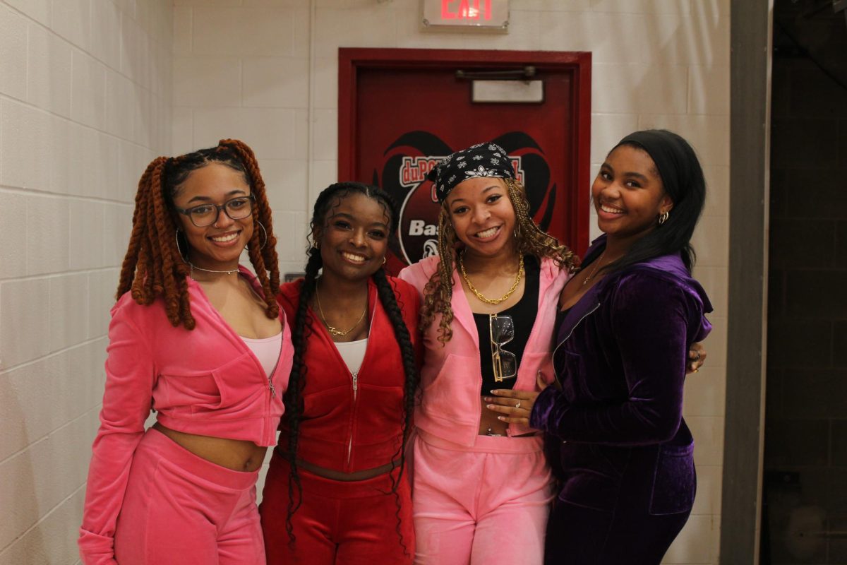 Paige Malone (12, HSU), Rahni Allen (12, HSU), Timyah Hall (11, HSU) and Avery Tandy (11, HSU) dressed for the homecoming "Y2K" theme. 