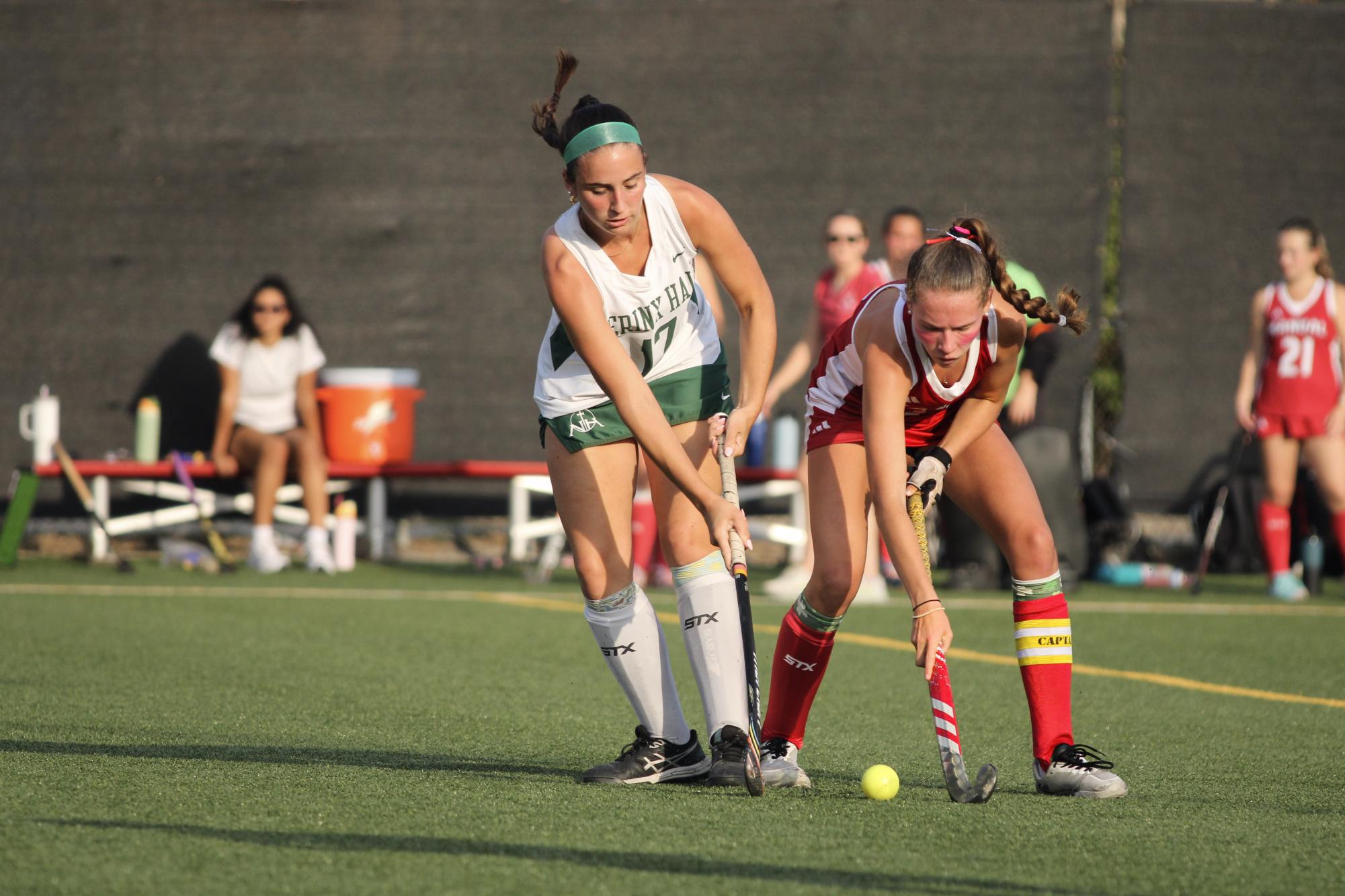 Charolette Connally (#17, 12) tries to make her way around Nerinx Hall's players.