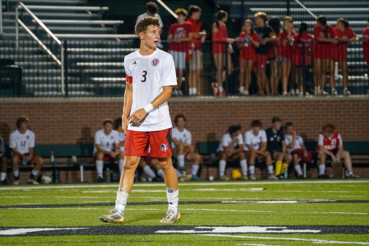 Cole Seraphine (#3, 12) walking on the field.