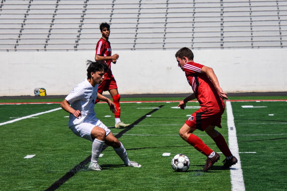 Luca Berrisford (#7, 11) tries to outplay a Franklin County defender.