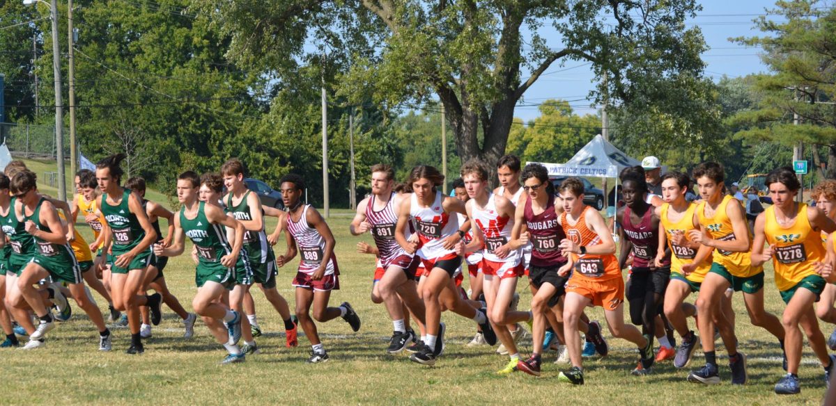 Boys team begin the St. Xavier Junior Varsity 4K.