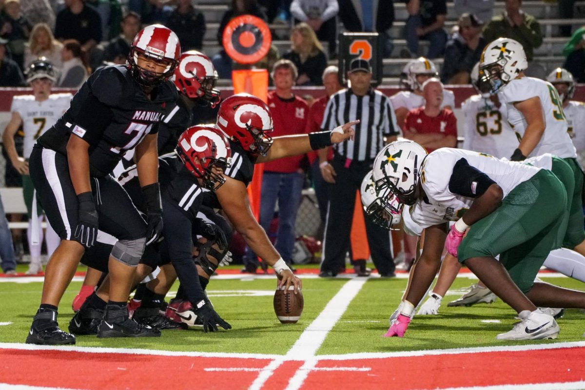 Manual's offense lines up to start the play.