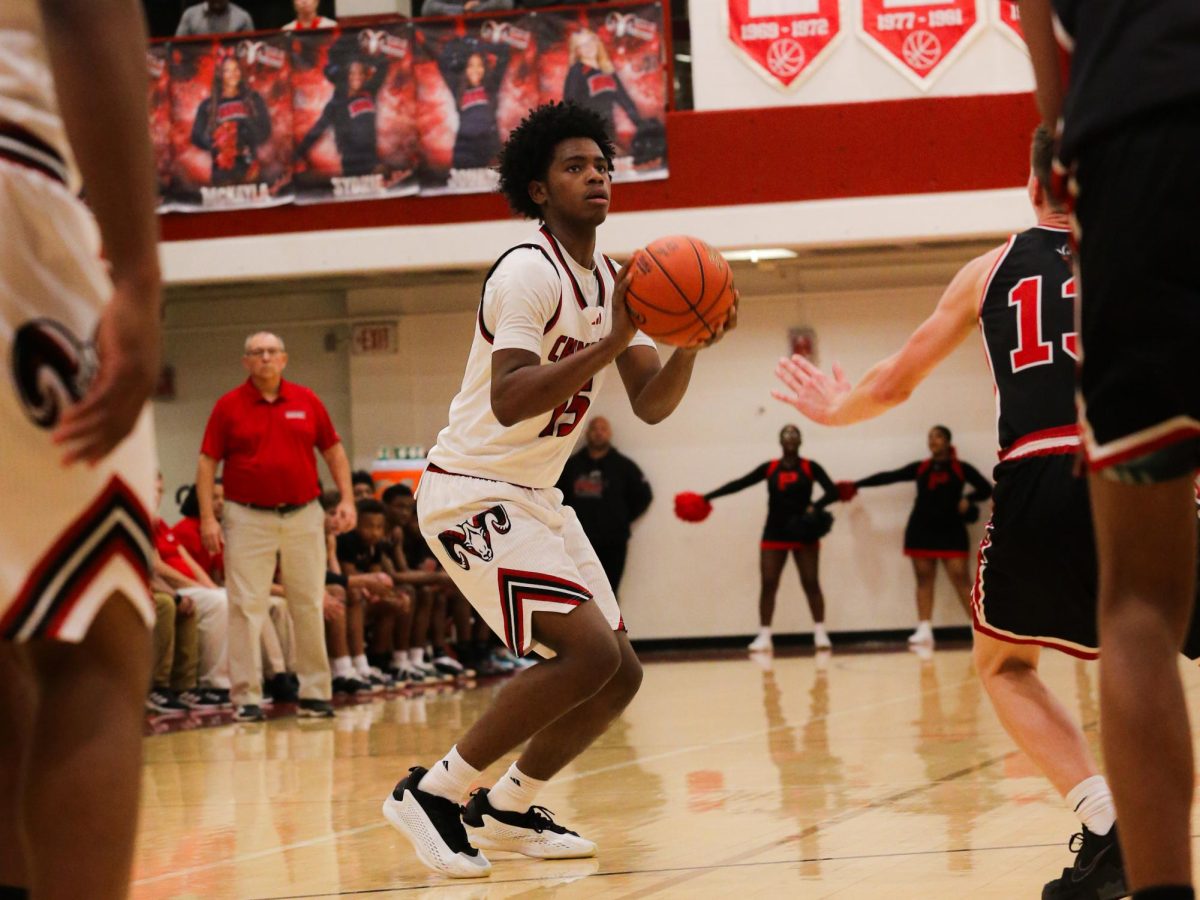 Mark Woods (12, HSU) has made an impact on Manual's basketball team and continues to grow as a leader. Photo courtesy of Julius Bledsaw.