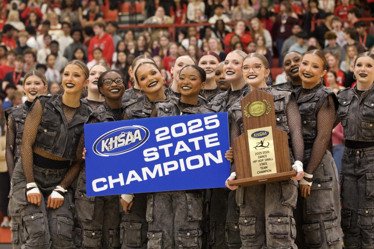 The Manual Dazzlers celebrate their 2025 state championship during the pep rally.