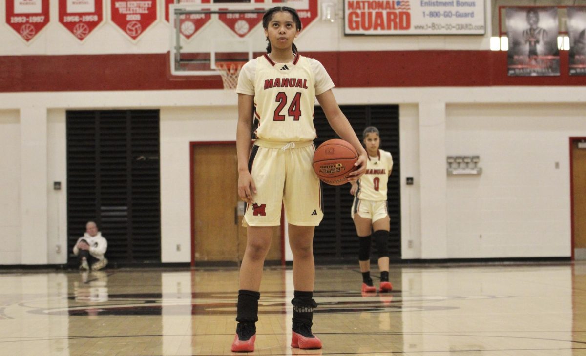 Brooklyn Davis (#24, 12) focuses and takes a deep breath before her free throw.