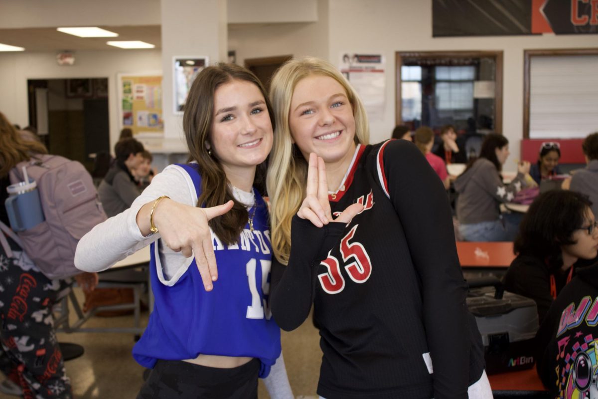 Cecelia Haynes (11, HSU) and Evelyn Watson (9, HSU) pose in their jerseys.