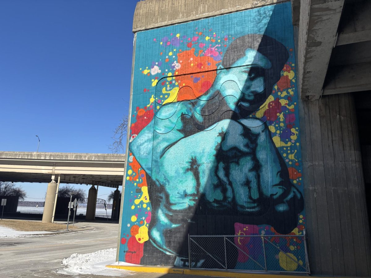 The "I Am The Greatest" mural across the street from the Muhammad Ali center honors the late boxing legend.